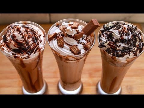 Three chocolate shakes with cream