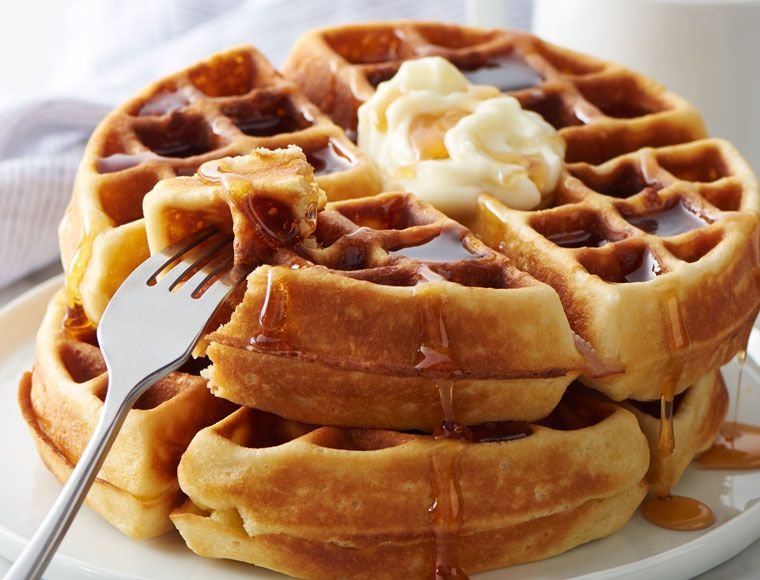 Waffles with butter and syrup
