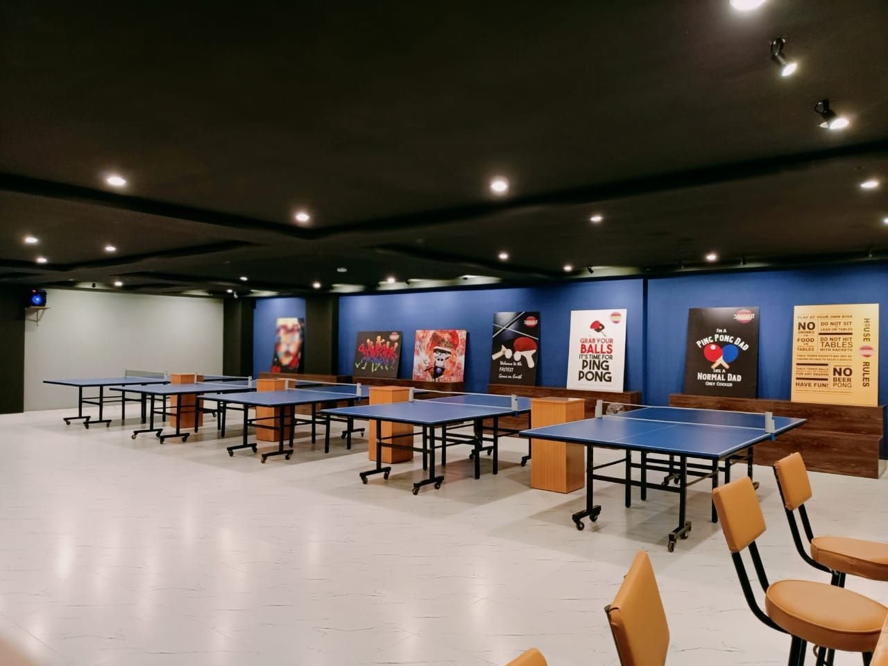 Rows of blue table tennis tables in the hall