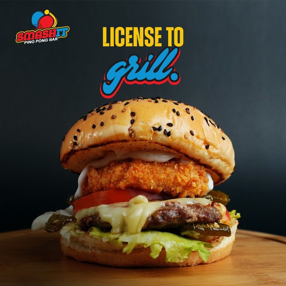 SMASH IT poster: License to grill, with a stacked chicken burger