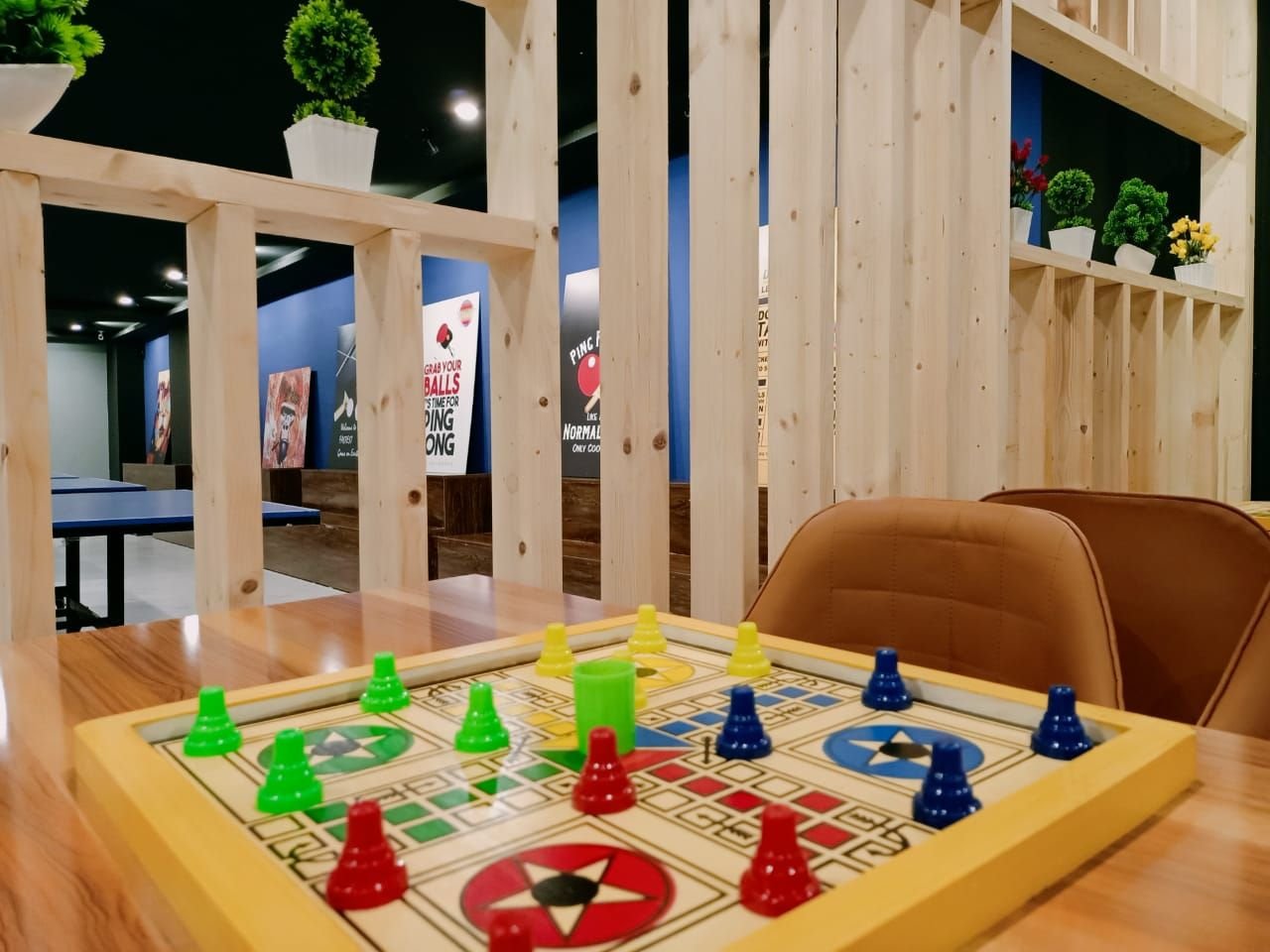 Ludo board on a wooden table